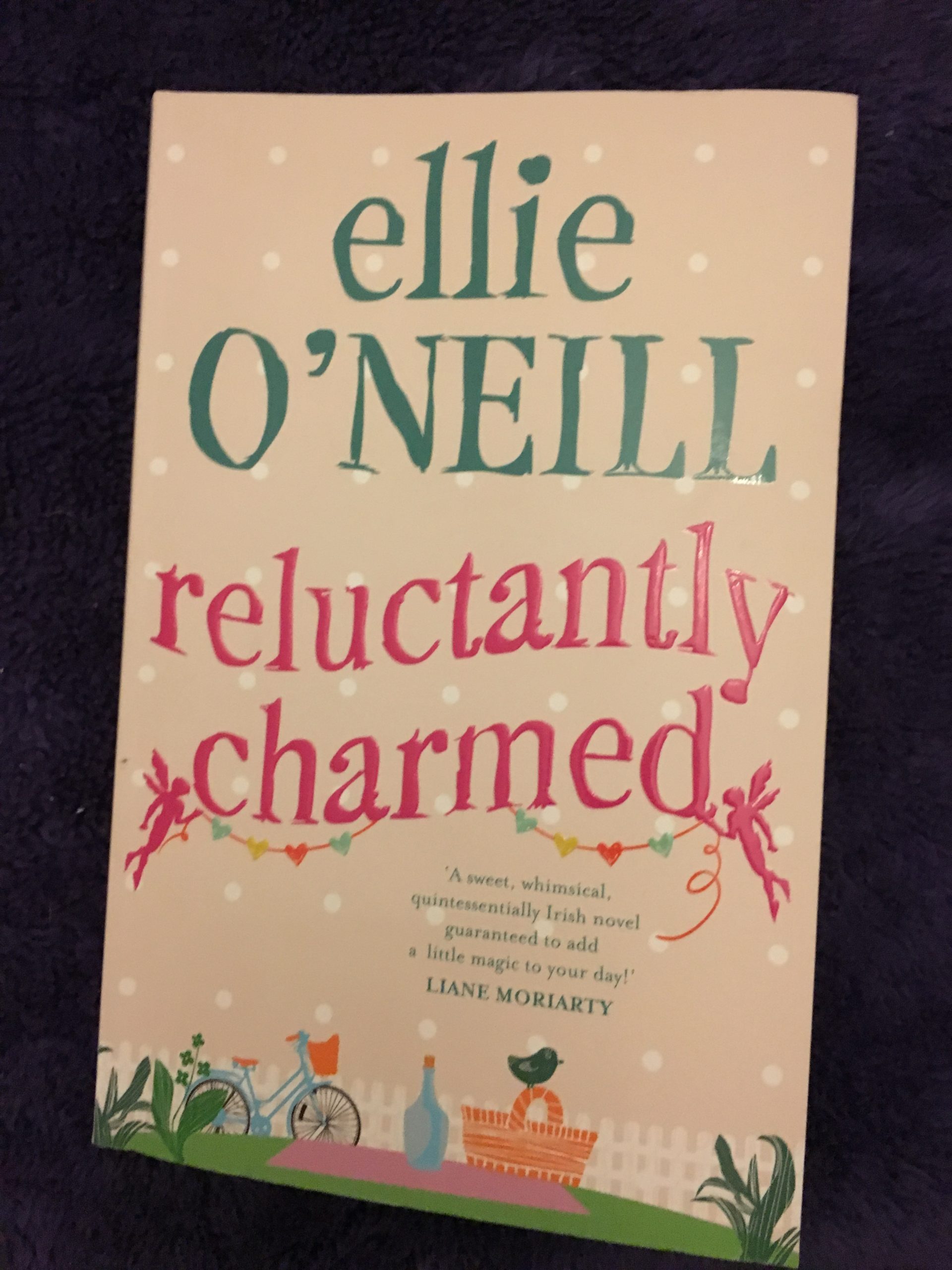 BOOK REVIEW: RELUCTANTLY CHARMED